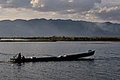 Inle Lake Myanmar. All the buildings are constructed on piles. Residents travel around by canoe, but there are also bamboo walkways and bridges over the canals, monasteries and stupas. 